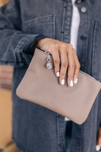 Load image into Gallery viewer, Momentary Wristlet | Zippered Clutch with Handle | Made with Repurposed Automotive Leather