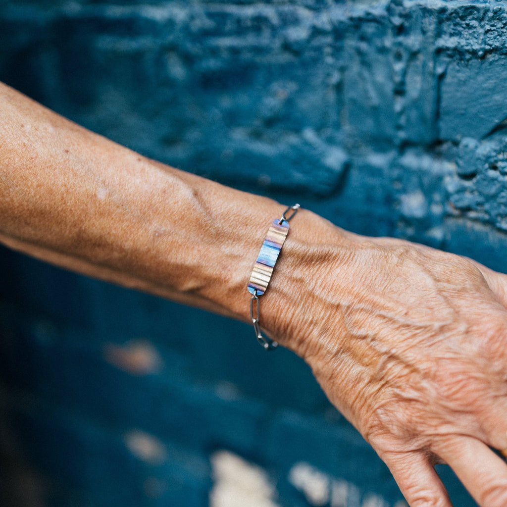 Ripple Effect Adjustable Bracelet | Fire Patina Steel Focal Point with Stainless Steel Paperclip Chain