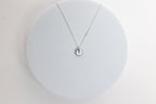 Known Heart close up silver necklace flatlay closeup