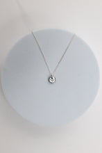 Load image into Gallery viewer, Known Heart close up silver necklace product flatlay