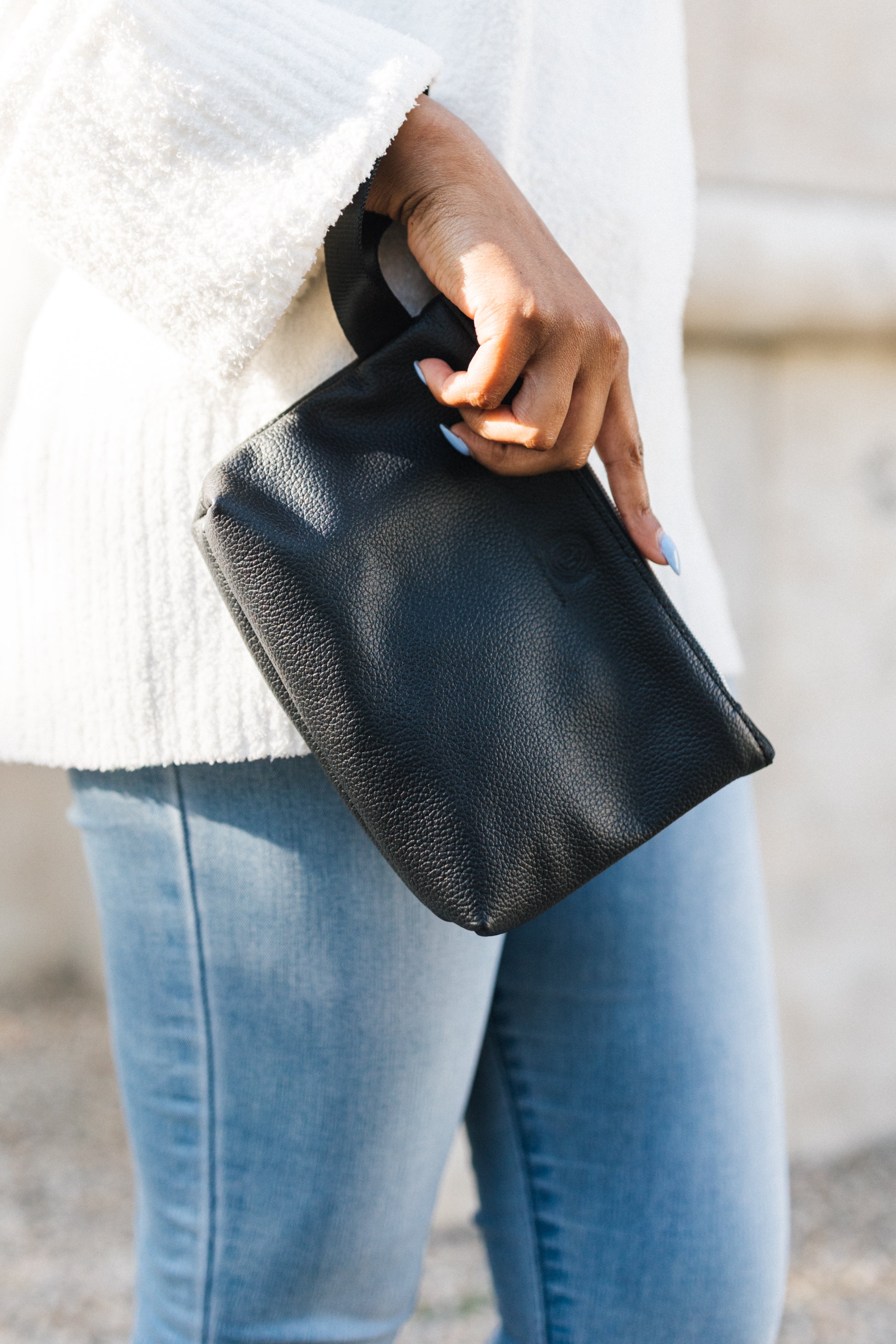 Reach Out | Zippered Wristlet made from Repurposed Automotive Leather