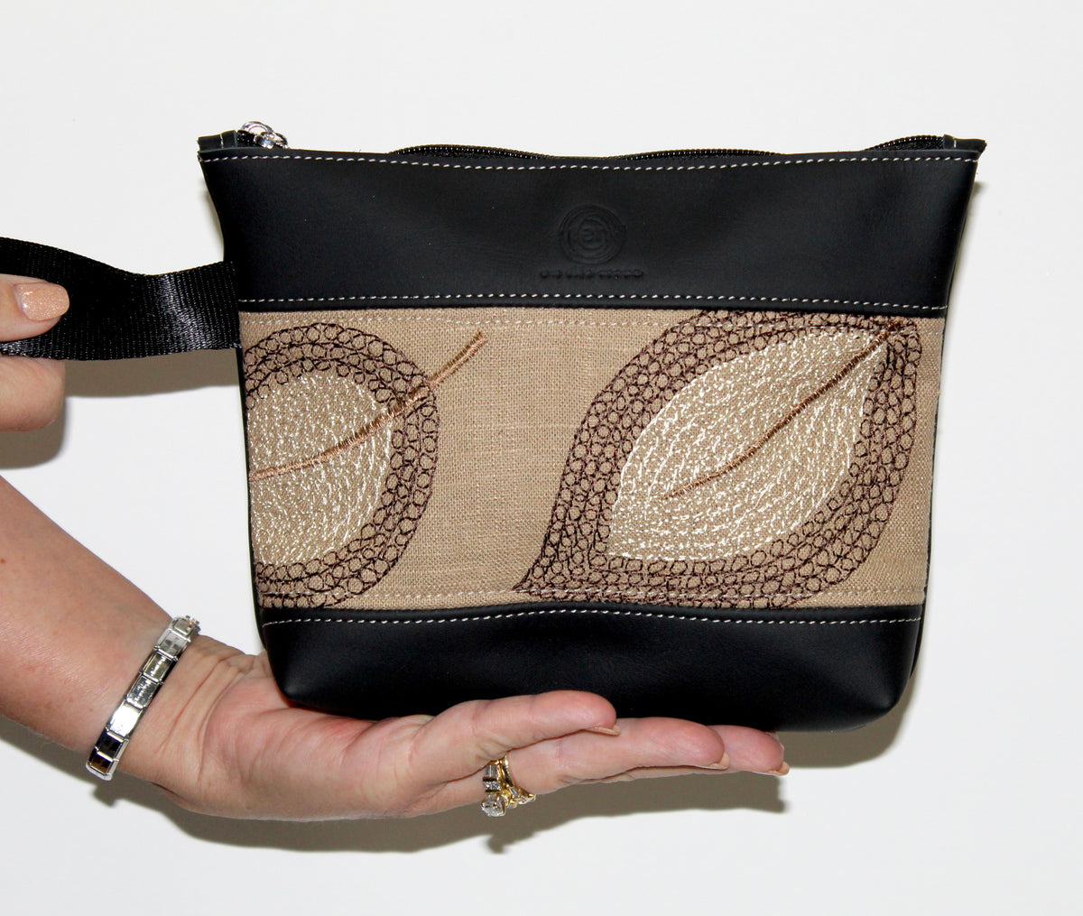 Piece by Piece Wristlet | Upcycled Auto Leather & Fabric | One of a Kind | Neutral Color Leaf Pattern