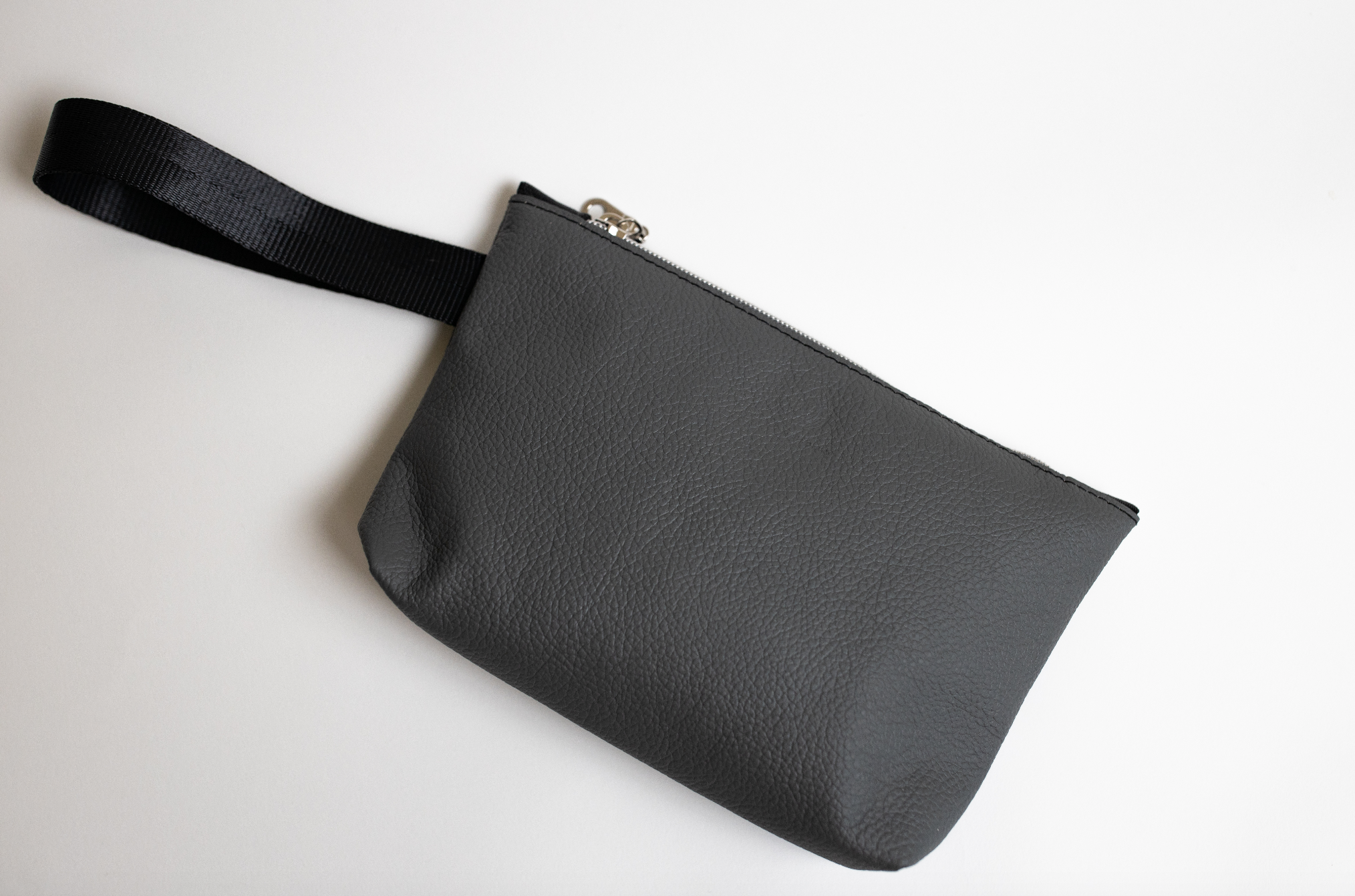 Reach Out | Zippered Wristlet made from Repurposed Automotive Leather