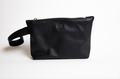 Reach Out | Zippered Wristlet made from Repurposed Automotive Leather