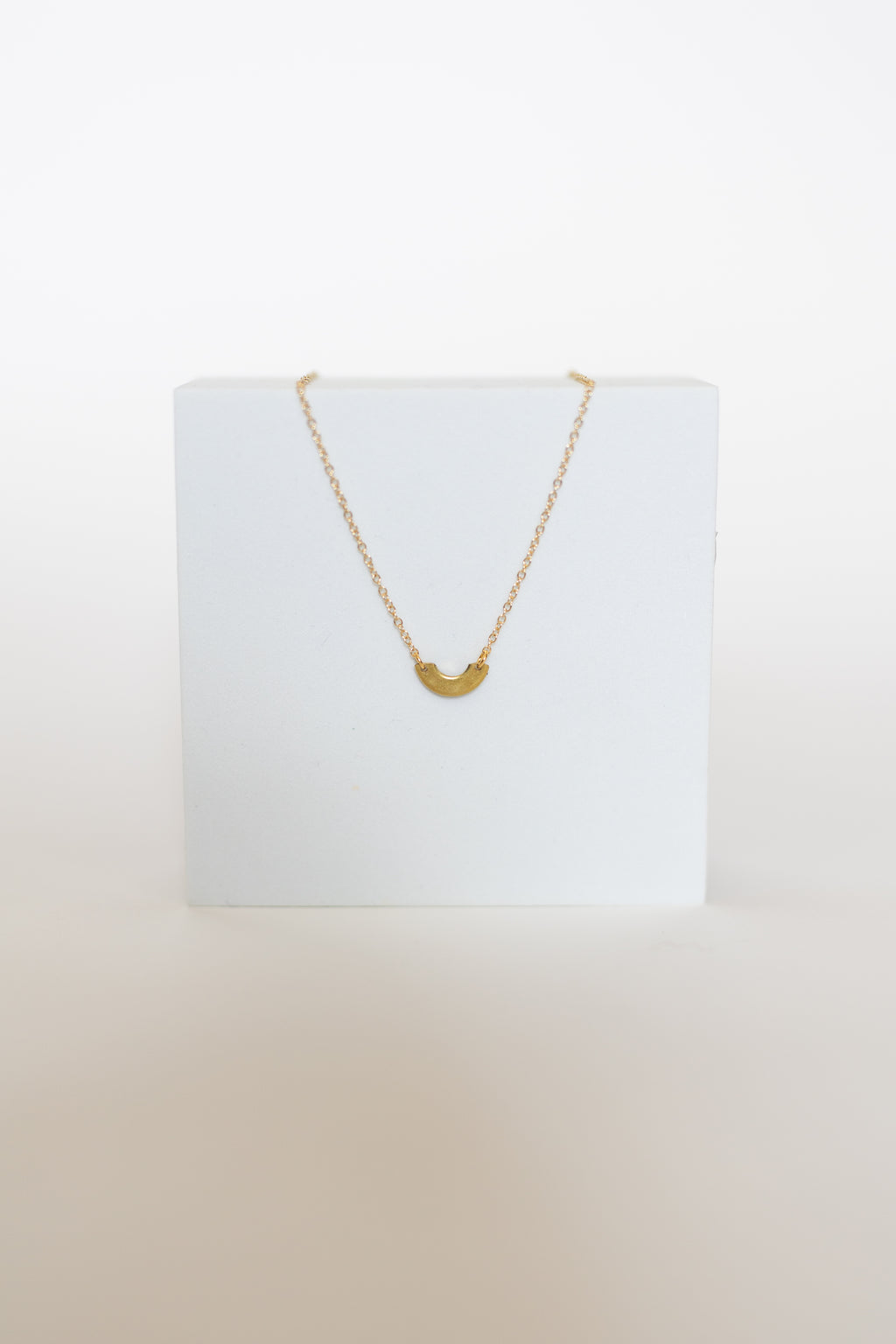Sustainable necklace crafted from upcycled auto parts