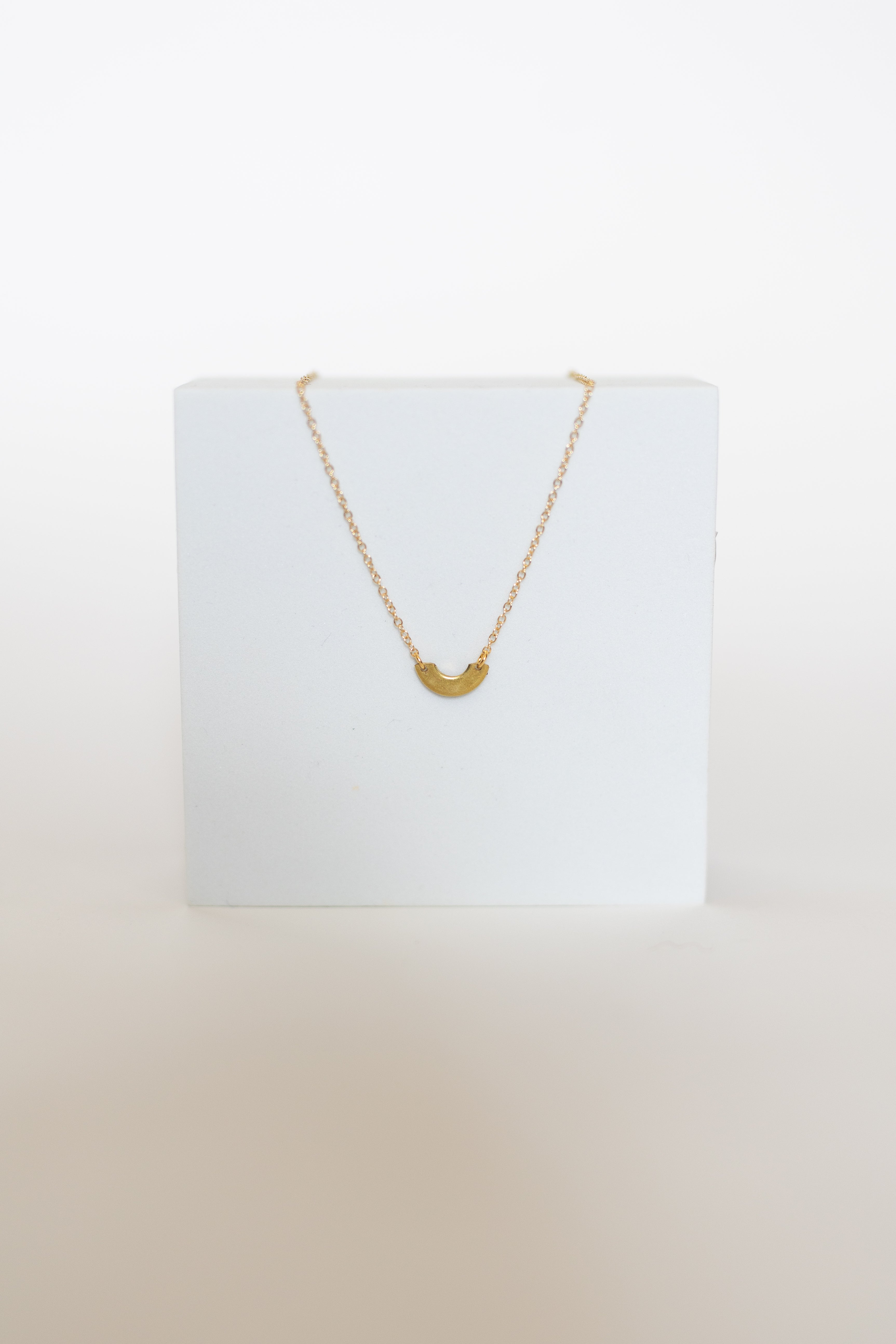 Sustainable necklace crafted from upcycled auto parts