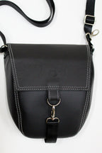 Carried | Convertible Backpack Crossbody | Salvaged Leather Head Rest donated by Ford