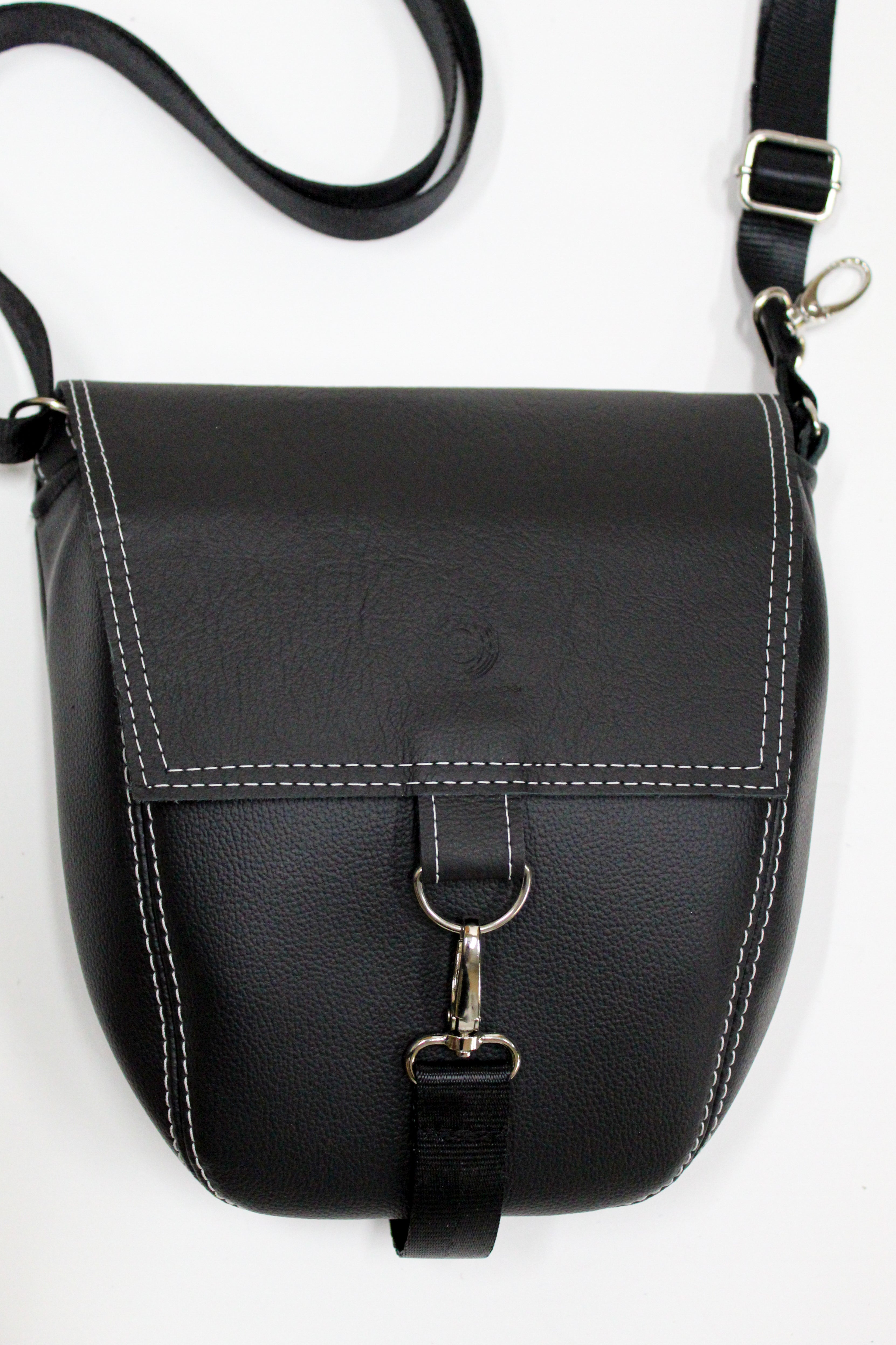 Carried | Convertible Backpack Crossbody | Salvaged Leather Head Rest donated by Ford