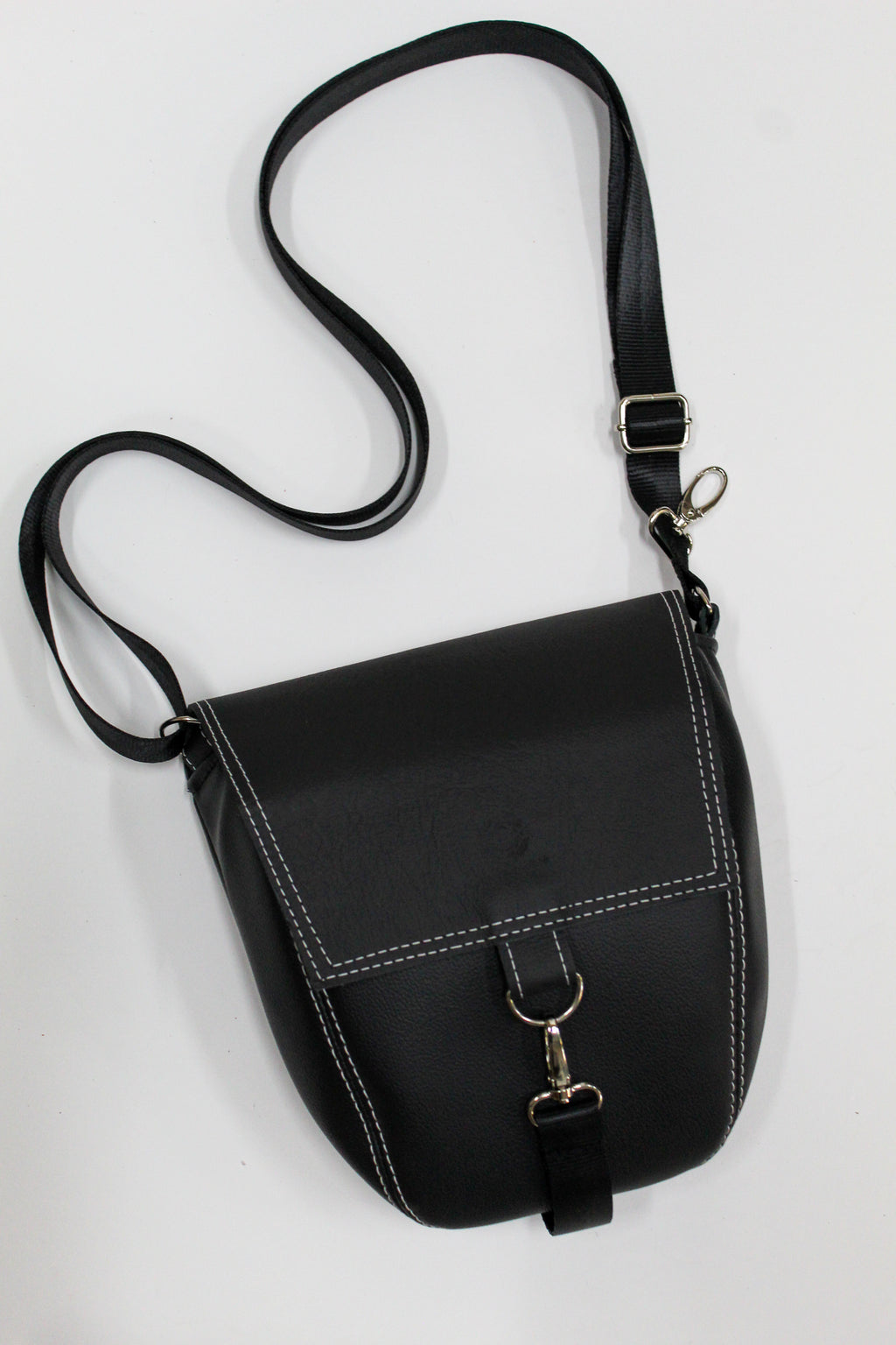 Carried | Convertible Backpack Crossbody | Salvaged Leather Head Rest donated by Ford