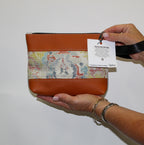 Piece by Piece Wristlet | Upcycled Auto Leather & Fabric | One of a Kind | Rust Orange Abstract