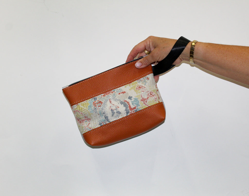 Piece by Piece Wristlet | Upcycled Auto Leather & Fabric | One of a Kind | Rust Orange Abstract