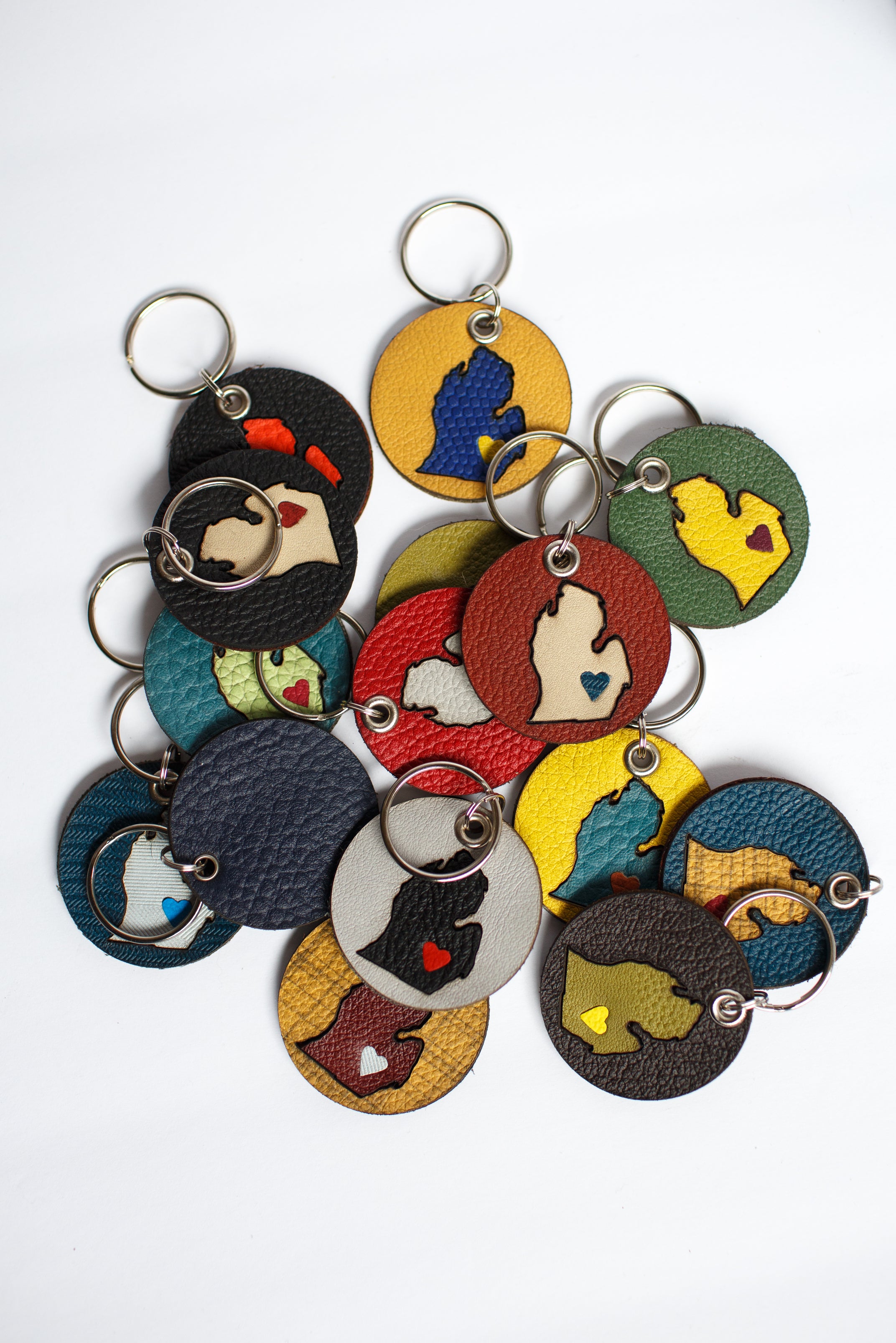 On the Move Michigan Keychain | Repurposed Automotive Leather | Team & Various Colors Available